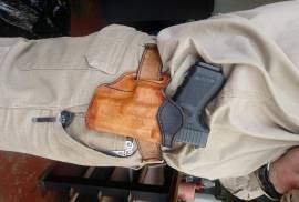 Custom leather holsters , We manufacture a wide range of holsters for any firearm. Our specialty is holsters that are not readily available on the commercial market. Contact us for the different styles of holster that we do manufacture as well as the possibility to design and custom build a true one of a kind holster for you.
The quality we offer you will not be able to find anywhere in South Africa. Our leather holsters goes through 17 steps before we deem it of such quality that we send it out.

We have a huge inventory of stock for a wide assortment of handguns available as we were able to manufacture during lockdown.