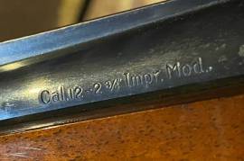 Dynamit Nobel Rottweil 67g Semi Auto 12 GA shotgun, Made in Germany
Engraved hunting scene on receiver
Vent ribbed barrel