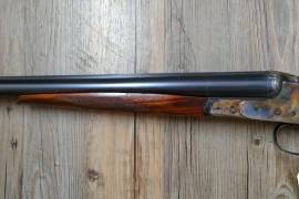 BAIKAL, BAIKAL Model IJ-26-E 12GA side x side shotgun in good overall condition