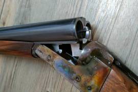 BAIKAL, BAIKAL Model IJ-26-E 12GA side x side shotgun in good overall condition