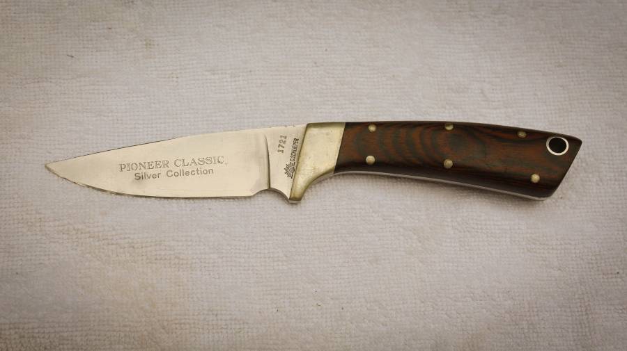 CARL SCHLIEPER SILVER COLLECTION KNIFE, Early 1980's limited edition serial number 1721.  Overall in good condition with a small nick on the edge that needs polishing out.  Here is your chance to own a rare authentic 