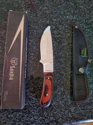 Hunting kn, Brand new Sanjia hunting knife for sale. Fixed blade and comes with sheath. 0814083077. WhatsApp also welcome.