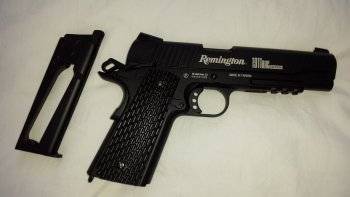 Remington , Full metal blowback Remington 1911 for sale. Full size dropdown magazine holds the 12g co2 gas cylinder. Watsapp Ricardo if interested 0833622197