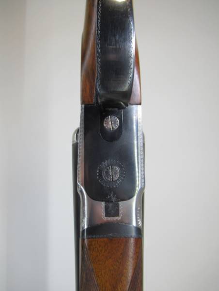 FN , Belgian, 12 Gauge side-by-side shotgun, 27
