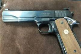 For Sale, This .45 was an US Army issue. It was originaly grey but then I had it cleaned up and blued.
Also the handles were replaced. During the second world war the 1911's were not only made by Colt but by Singer and Remington.