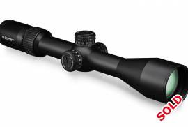 Vortex Diamondback Tactical 6-24x50 FFP, The focal plane reticle in the Vortex Diamondback Tactical 6-24x50 FFP Riflescope allows shooters to use the information-packed EBR-2C reticles for ranging, holdovers or windage corrections on any magnification. Housed inside its durable, one-piece aluminum tube is a 4x optical system delivering excellent edge-to-edge clarity and sharp resolution. Exposed elevation and windage turrets are low profile enough to stay out of the way in packing situations, but offer the quickness, ease and precision of dialing accurate shots at distance. A side adjustable parallax gives shooters peace of mind by removing parallax error from the equation from 9.1 m to infinity.