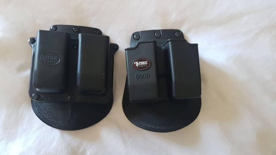 FOBUS DOUBLE MAG POUCH FOR GLOCK 9MM , Two(2)x Fobus Double Magazine pouches for Glock 9mm pistols. Model 6900. R500 for both. Postage cost for sellers account. 