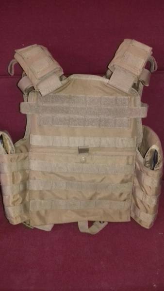 Imported Plate Carrier, Condor plate carrier with triple curved front and back plates aswell as side plates...Front and back spal coating and front and back impact absorbers...All plates are LV III+ Brand new reluctantly selling as im going back to the USA