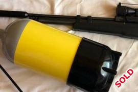 PCP Air Rifle + Silencer, Dive Cylinder & Scop, Overall good condition. Accurate and shoots well. One seal seams to be leaking air.  Not sure where to service or fix it.  Comes with original hand pump, dive cylinder, Nikon Sterling scope, 2 x magazines and some pellet rounds + spare parts.