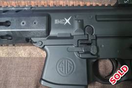Sig Sauer MCX Semi Auto Co2 Rifle, I haver a Sig Sauer MCX Semi Auto air rifle for sale. Still new bought it in December Used once. Has keymod Rails for attachments. I have 1 extra co2 bottle for it and about 450 pellets.