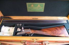 Andre , Cased shotgun , built in 1997 , hardly used .
28 inch barrels