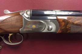 Bettinsoli Grand Prix sporting shotgun, Bettinsoli Grand Prix 30' sporting shotgun. Multi choked barrels, barrel selector and quality walnut stock. Stylish minimal engraving on the action with a great balance. Italian reliablility at an afordable mid range price.
