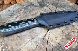 Handmade Harpoon Style Utility Knife, Handmade harpoon style utility knife made from leaf spring. Heat treated to approximately 57-59 Rockwell. Black and grey G10 scales and kydex sheath. Shipping excluded.