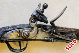 17th century flintlock pistols, A exquisite set of flintlock 1700 century pistols with all its origonal patina and fine art engraved silver barrels and silver dots all over the wood work and engravings on almost every single part of steel these are two amazing flintlock pistols.
dated to the early 17th century ! Out of the mid eastern parts ! 

pls contact me for more details and photos ! 