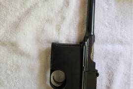 Mauser with wooden case, Mauser with clip on wood stock. 