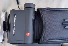 Leica 2800.com Rangefinder with Tripod Adapter, Leica 2800.com Rangefinder including a Tripod Adapter of R1700. The only better rangefinder is the new model 3000. Please do research, it is much more than just a rangefinder. It make you with your calibrated rifles deadly accurate over very long distances, uphill, downhill etc.