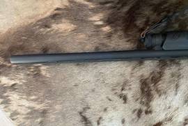Pump Action Shotgun, R 5,000.00