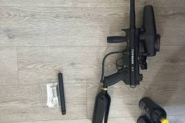 Tippmann A5 - Paintball Marker, Almost brand new paintball gun with lots of exstras.

Upgraded parts.
Response trigger.
Red dot scope