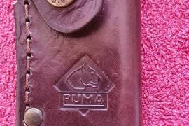 PUMA KNIVE, PUMA SKINNER WITH DEER HORN HANDEL.  
IN MINT CONDITION.  NEVER BEEN USED