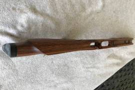 Laminated Thumb Hole Stock for Savage Mod 12 SA, Laminated Thumb Hole Stock brown for Savage Mod 12 Short Action in a like new condition.