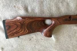 Laminated Thumb Hole Stock for Savage Mod 12 SA, Laminated Thumb Hole Stock brown for Savage Mod 12 Short Action in a like new condition.