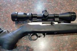 Ruger 10/22 Anniversary Model, 50 Anniversary model with muzzle brake, peep sights, 2 x 10 round magazines.
Hawke Ballastic illuminated scope with picattini rail.
Factory mould Stock
