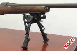 Mauser M12 308, Grade 3 wooden stock with a jeweled bolt.
