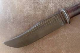 Mountain Man handcrafted knife, This knife was handcrafted from a farmers file into a beautiful 17,5 cm blade. The handle is made from leather and a kudu thigh bone. 