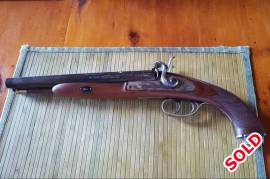 PEDERSOLI HOWDAH, Hardly fired.   Double barreled pistol .5/20bore (rifled / shotgun).  Very rare weapon in as new condition.   Comes with some balls and some lead shot in box.   Imported from USA 3 years ago.   Only selling as I am leaving SA.  May consider a close offer!   This is definitely a Black Powder collector's piece.