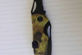 Buffalo River Knife, Buffalo River knife, foldable, comes with own pouch. Has two blades, one normal, one is a serrated edge. Mint condition. R450.