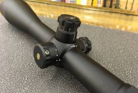 Leupold Mark 4 ER/T 6.5-20x50 H27 FFP M5, Leupold Mark 4 ER/T 6.5-20x50mm rifle scope, first focal plane H27 mils reticle, M5 adjustments (110086). For use in extended long range tactical situations or competition.

Condition:  brand-new, unused,undamaged item in its original packaging
Brand:     Leupold
MPN:  110086
Model:  Mark 4
Lens Diameter:  50mm Maximum Magnification: 20x
Color: Black
Reticle:     H27
UPC: 030317100865

Specifications and Features:
Extended Range/Tactical Front Focal riflescope
 Features positive M5 windage & elevation adjustment dials w/audible, tactile 1/10-MIL clicks
 Rugged, fog-proof & waterproof
 Matte black finish
 30mm tube
 Xtended Twilight Lens System - Leupold index matched glass w/wavelength specific lens coatings
 designed to optimize the transmission of low-light wavelengths so you see the details of low-light
 scenes in greater, brighter detail
 Front focal plane reticle allows ranging at all magnification settings
 Lockable, fast-focus eye-piece
 Side focus parallax adjustment - 75 yds. to infinity
 Includes flip-open lens covers