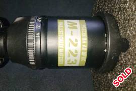 Nikon M223 4-16x42 BDC 600, This AR specific optic has brilliant glass and useful magnification.  Great for competition shooting and hunting on AR or bolt action.  Comes with a set of picatinny rings and scope caps. Parralax adjustment very accurate.  Many reviews on line.  All impressive.  