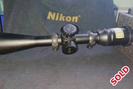 Nikon M223 4-16x42 BDC 600, This AR specific optic has brilliant glass and useful magnification.  Great for competition shooting and hunting on AR or bolt action.  Comes with a set of picatinny rings and scope caps. Parralax adjustment very accurate.  Many reviews on line.  All impressive.  