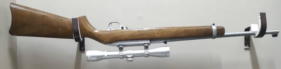 Ruger 10/22 Stainless, Ruger 10/22 Stainless with Wooden stock. Includes Simmons 4x32 scope as well as 10 round rotary mag and 25 round extended mag.