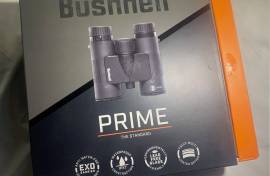 Bushnell 8x32 Prime Roof Prism Binocular brand new, Exclusive EXO Barrier Protection Bushnell's newest and best protective lens coating molecularly bonds to the glass, repelling water, oil, dust, debris and preventing scratches.

IPX7 Waterproof construction? – O-ring sealed optics stay dry inside, when immersed in three feet of water for up to 30 minutes.

Fully Multi-Coated Optics – Multiple layers of anti-reflective coating on all air-to-glass surfaces deliver bright, high-contrast images.