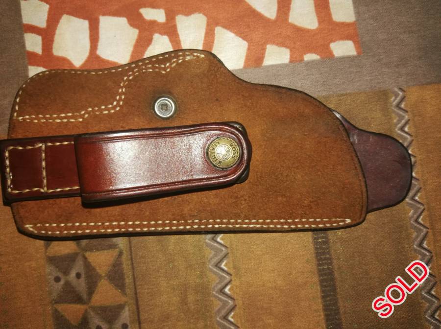Browning Hi Power / FEG / Luger M80 holster & , 1x Ross leather tuckable iwb holster almost new condition R350
1x Pachmayr Grips with finger grooves R150
 