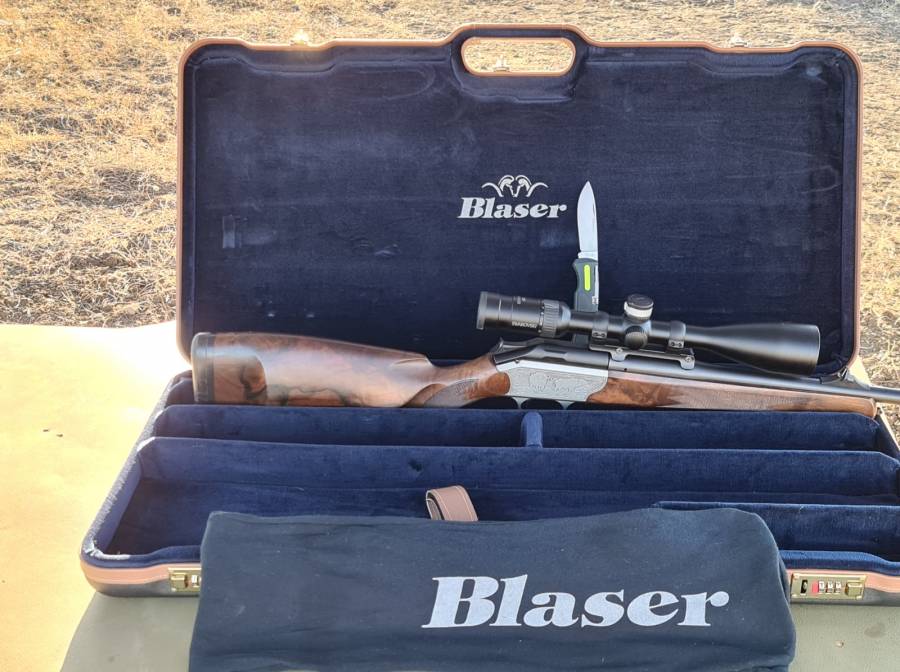 Blazer R 93 .Urgent sale owner immigrating, Blazer R 93 Custom made , discontinued , collectors item . Stock grade 8 out of 12 maximum. Zeis diavari 2*12*50 scope . Case complete blue velvet . 30-06 barrel and 375 H&H barrel . Limited a=addition blazer knive . Blazer shoulder strap . Left hand can be changed to right hand by purchasing a new bolt action . My baby looked after like gold . Urgent sale i am immigrating
