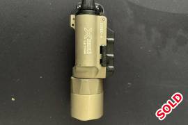 Surefire X300 Ultra, SUREFIRE X300 ULTRA (A)

MODEL: X300 Ultra (A)

COLOUR: Tan
 

KEY ATTRIBUTES

HIGH OUTPUT: 1,000 lumens

HIGH RUNTIME: 1.25 hours

PEAK BEAM INTENSITY: 11,300 candela

BATTERIES: Two 123A lithium

SWITCHING: Ambidextrous push/toggle

LENGTH: 9.1 cm


OUTPUT

OUTPUT: 1,000 lumens

RUNTIME: 1.25 hours

DISTANCE: 213 meters


BODY

CONSTRUCTION: Aluminum

FINISH: Mil-Spec Hard Anodized

WEIGHT WITH BATTERIES: 113 g

BEZEL DIAMETER: 2.9 cm

LIQUID INGRESS PROTECTION: IPX7

 