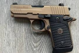 SIG SAUER P938 EMPEROR SCORPION, SIG SAUER P938 EMPEROR SCORPION

Gun is in perfect condition no scratch
With factory case, two 7rd magazines.
