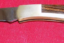 GERBER VINTAGR LOCK BACK KNIFE, GERBER Oregon USA  “FOLDING SPORTSMAN IID” vintage collectable 1970s lockback knife with brass and wood, overall length open 200mm. Brand new, never used or carried.
 