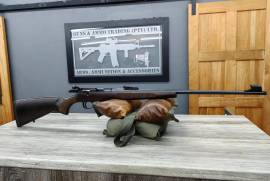 CZ 457 .22LR LUX, A traditional European hunting rifle design in a rimfire configuration. The Turkish walnut cheekpiece and varnished stock are of superior quality, with checkering etched by laser. Conventional iron sights are included as standard.