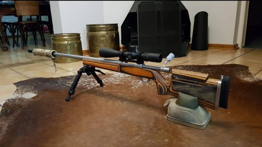Howa 6.5 Creedmoor with laminated long range stock, Howa stainless steel 24-inch bull barrel with long range laminated stock and Gun warrior silencer. Only 400 shots through the barrel.



 