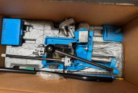 Dillon 650xl , Dillion 650xl with Dillon 9mm carbide dies and Dillon auto case feeder. 
set of .40s&w does as well. 
with additional Dillon quick changer kit. 
machine was serviced by shoot stuff in 2023

currently sorted in it's original box. Not in use 