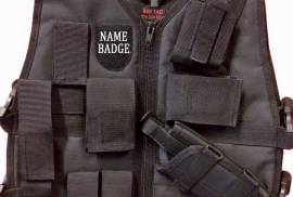 TACTICAL BULLETPROOF VEST, TACTICAL BULLETPROOF VEST –R3700
SIZES (XS-3XL)
(INCLUDING PLATES)
DESCRIPTION: CONSIST OF HOLSTER, POUCHES FOR PEPPER SPRAY, CELL PHONE, RADIO, 2 MAGAZINES, HAND CUFFS, TORCH, PEN.  VELCRO FOR NAME BADGE.
BACK OF THE VEST POUCH FOR CABLE TIES AND VELCRO FOR COMPANY NAME,
PLATE CARRIERS TO INSERT PLATES AND BACK AND FRONT LEVEL IIIA PLATE.
 