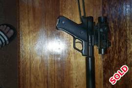 .22 semi auto pistol for sale red dot.. silincer., 
.22 semi auto pistol for sale,Red dot sight,silincer,stock.very accurate for pest or target practice.very quit with subsonic ammo.