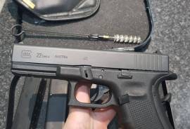 Glock 22 Gen 4, Very well looked after. I only had it for self defense, but looking to buy a different make firearm - personal preference.

Only shot 30 rounds 

2 magazines and adjustable straps and remora holster included. 