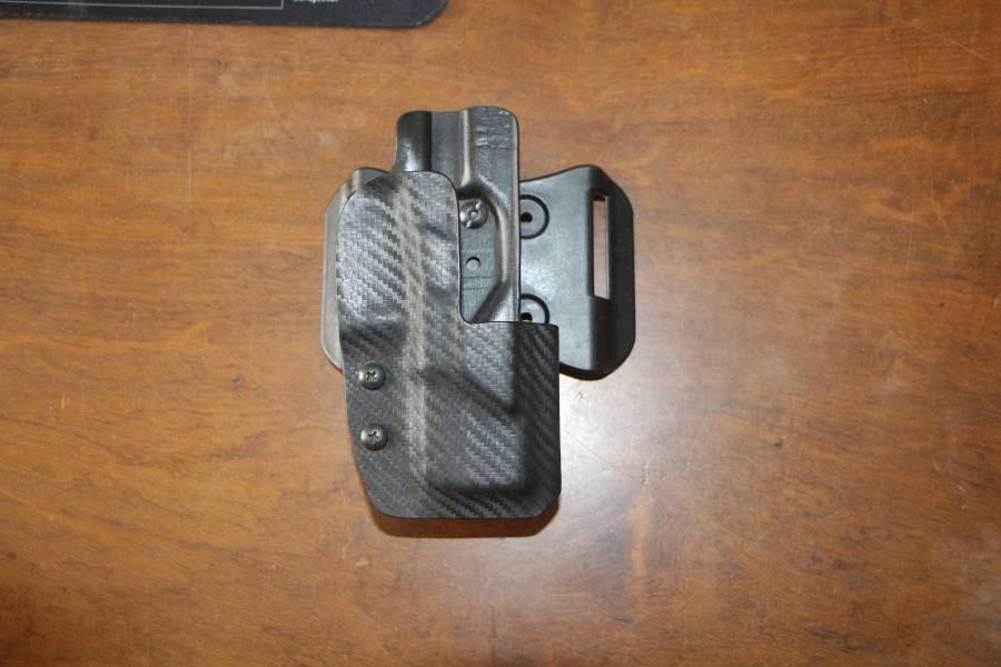 Glock 19 RH OWB sportscut holster , OWB right hand glock 19 gen 4 sportscut holster in a carbon fibre Kydex. Shipping for buyers expense.