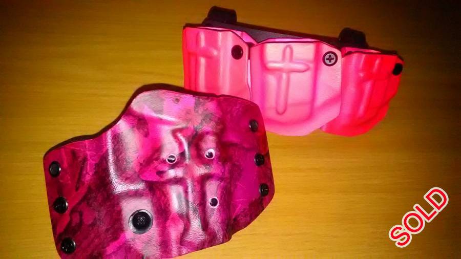 Ladies Custom kydex holster and mag carrier, Custom client spisific holster and mag carrier.
hyper pink cammo with crosses.
Be one of a kind. 