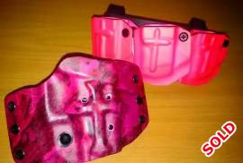 Ladies Custom kydex holster and mag carrier, Custom client spisific holster and mag carrier.
hyper pink cammo with crosses.
Be one of a kind. 