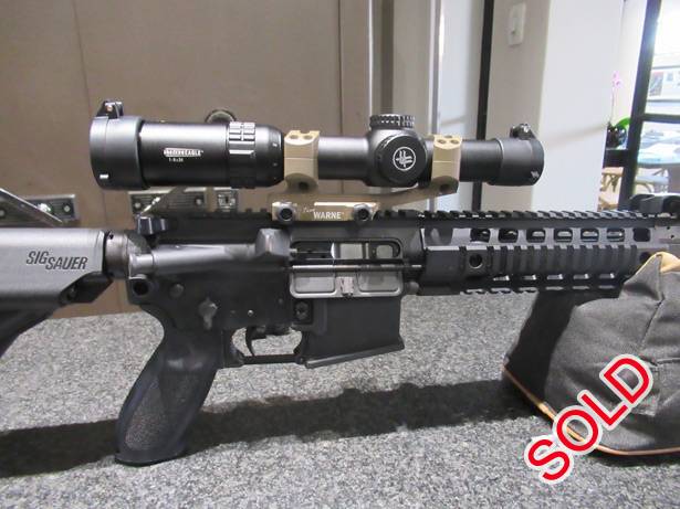 SIG SAUER 516 GEN 2 PATROL .223 PACKAGE, Gas-piston operated 5.56mm AR platform with a VORTEX STRIKE EAGLE 1-6 x 24 AR-BDC illuminated reticle scope and WARNE 30mm one-piece scope mount. Included in the package is an SSG Tactical Rifle Case as well as a WHEELER ENGINEERING DELTA SERIES Armorer's Vise. All the items are in really superb condition.